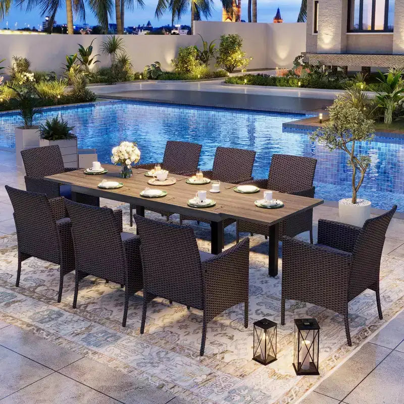 Captiva Designs Set da 9 Pezzi per Esterni con Tavolo da Pranzo Estensibile in Acciaio e Sedie a Mezzaluna in Rattan