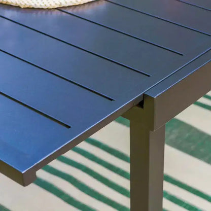 Ensemble de salle à manger d'extérieur 9 pièces avec table extensible en acier et chaises rembourrées - Captiva Designs : Mobilier d'extérieur résistant aux intempéries
