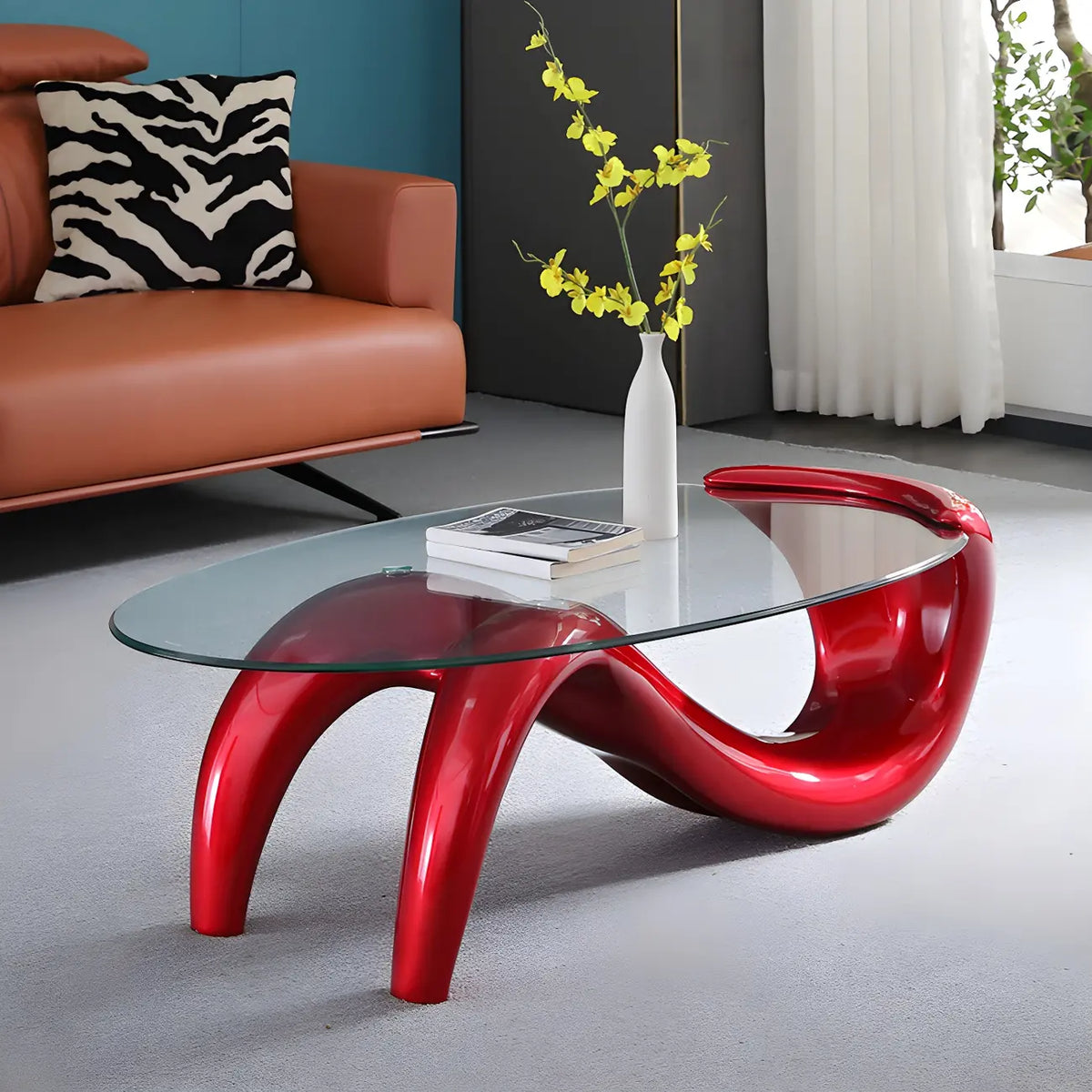 Table basse ovale moderne et abstraite avec plateau en verre et base en métal