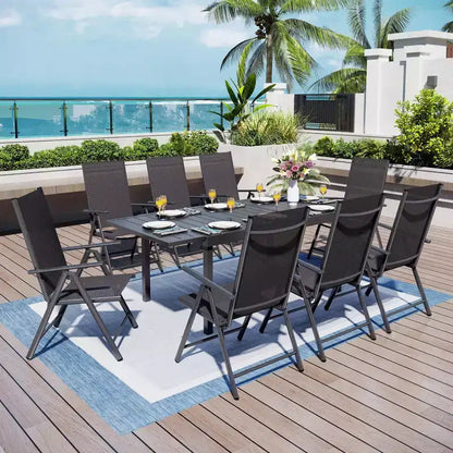Set da pranzo da esterni Captiva Designs 9 pezzi con tavolo rettangolare in acciaio regolabile con piano a doghe e sedie pieghevoli con seduta in textilene