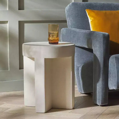 Round Accent Table ¨C White Sculptural Cross Base, Modern Indoor Design
