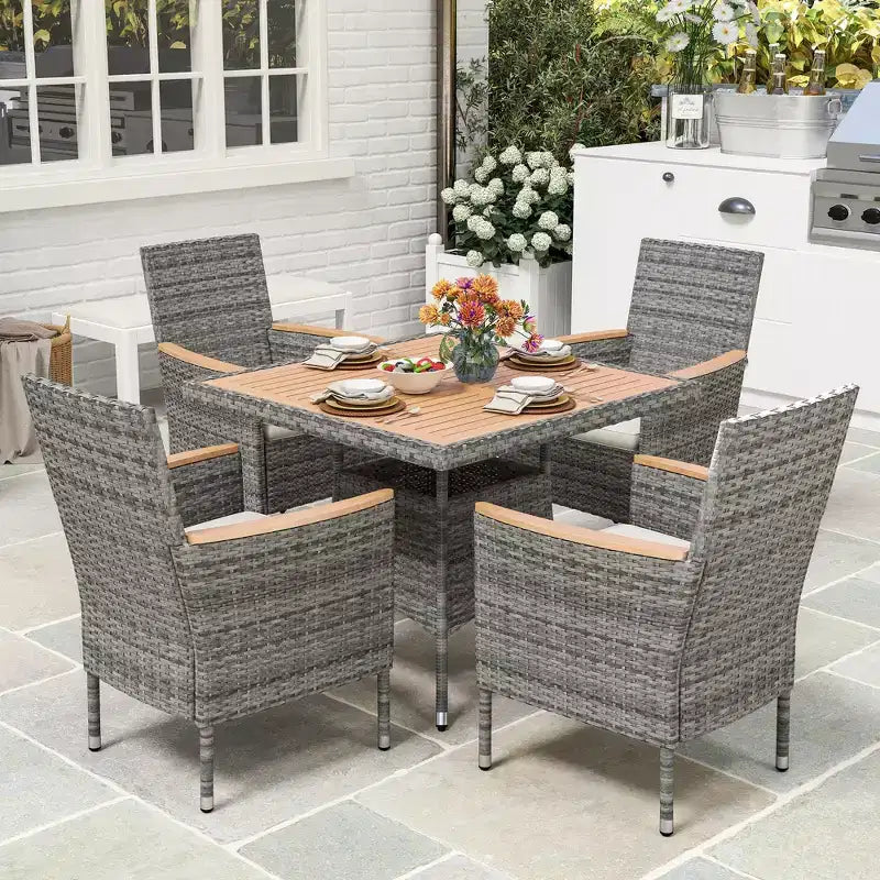 Set da pranzo da patio per 4, tavolo e sedie da esterno in rattan per tutte le stagioni con piano in legno di acacia