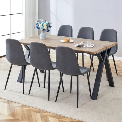 Moderno set da pranzo con tavolo rettangolare nero con base a forma di A e sedie con schienale rotondo