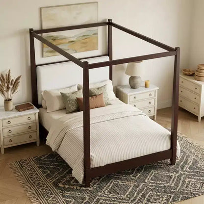 Letto a baldacchino con testiera imbottita