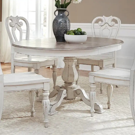 Tavolo da pranzo rotondo Magnolia Manor con base a piedistallo e prolunghe – 2 finiture