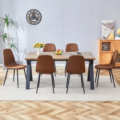 Moderno set da pranzo con tavolo rettangolare nero con base a forma di A e sedie con schienale rotondo