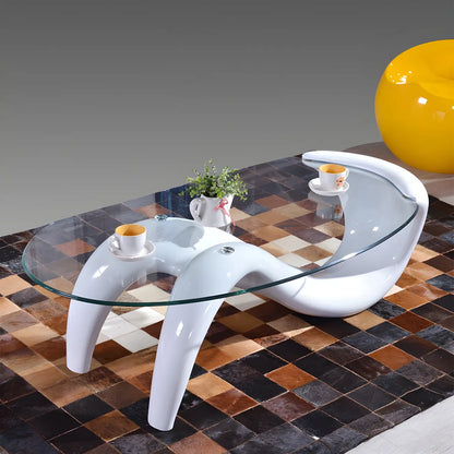 Table basse ovale moderne et abstraite avec plateau en verre et base en métal