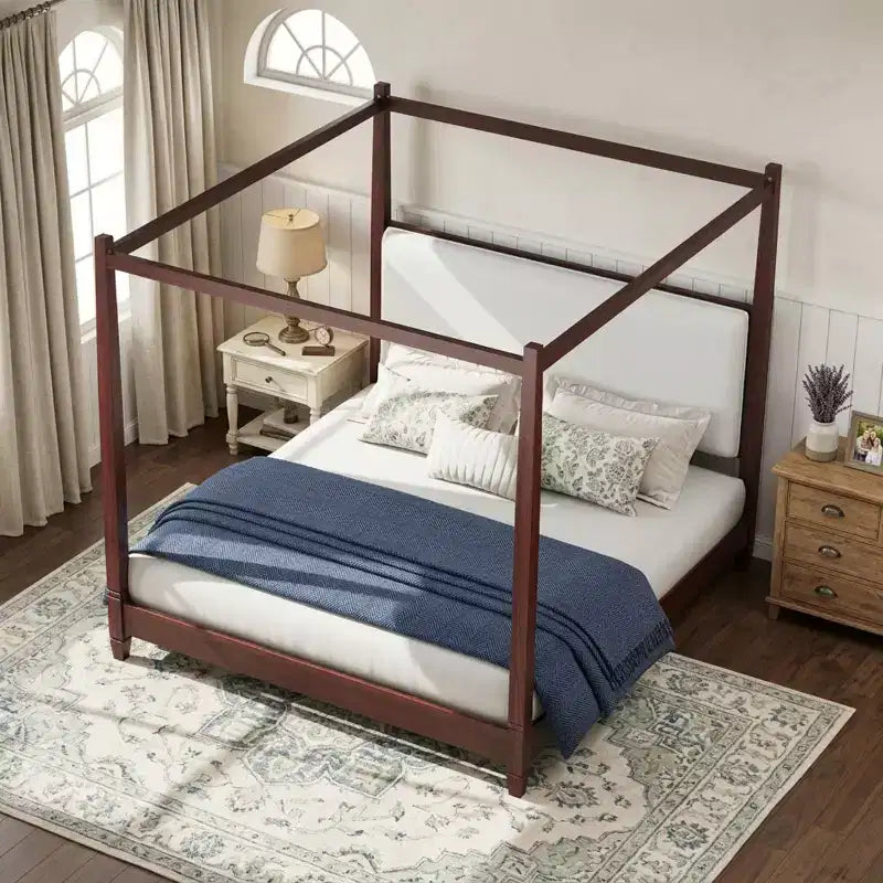 Letto a baldacchino con testiera imbottita
