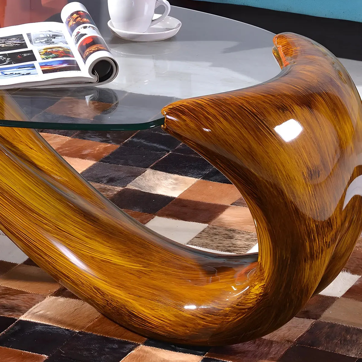 Table basse ovale moderne et abstraite avec plateau en verre et base en métal