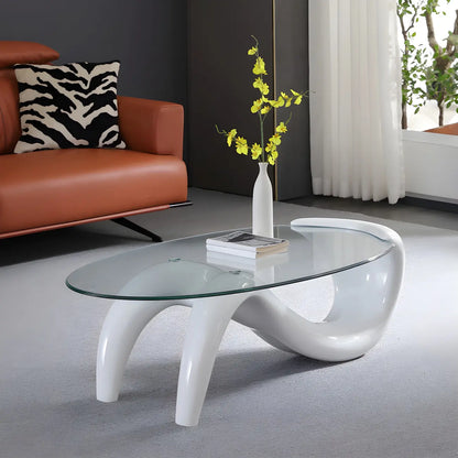 Table basse ovale moderne et abstraite avec plateau en verre et base en métal