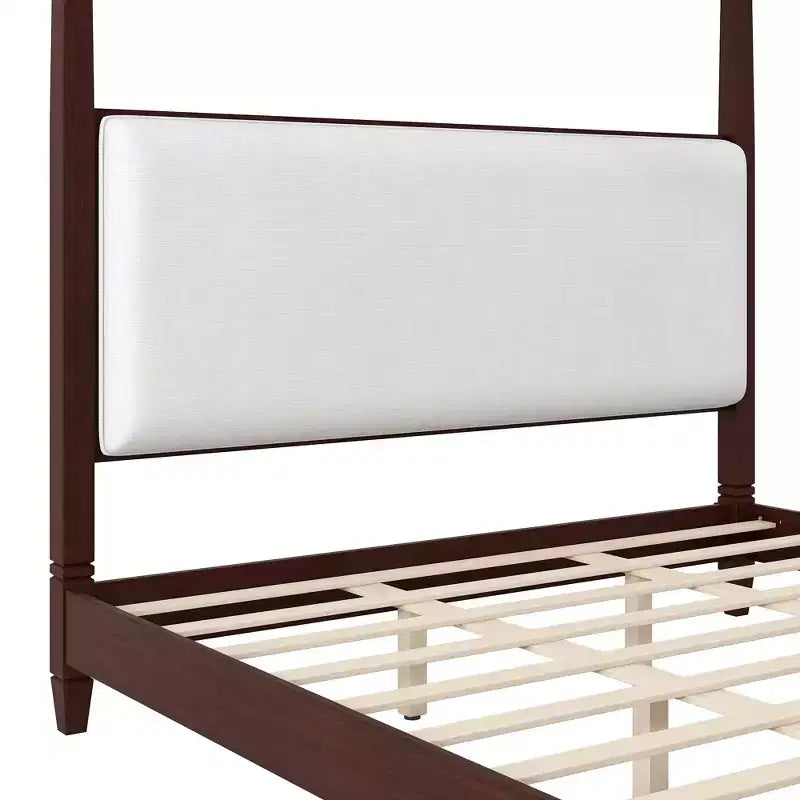 Letto a baldacchino con testiera imbottita