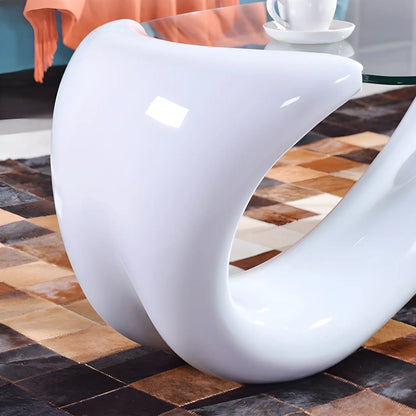 Table basse ovale moderne et abstraite avec plateau en verre et base en métal
